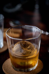 whiskey on the rock with perfect ice ball