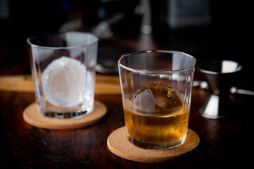 whiskey on the rock with perfect ice ball