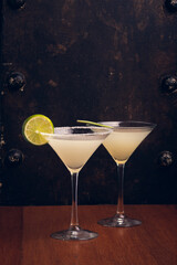 Margaritas on rustic background with space for text. Vertical shot