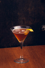 Fruit Martini on rustic background with space for text. Vertical shot.