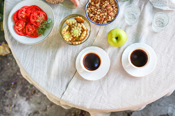 coffee and breakfast on the table outdoor food background top view copy space for text organic healthy eating