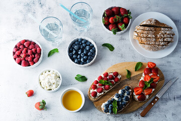 Fresh breakfast with Blueberry, Strawberry and raspberry ricotta rye sandwiches