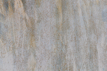Grey textured weathered backround with rust spots.