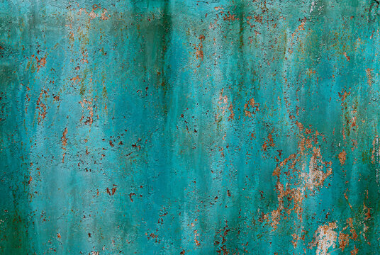 Turquoise cracked peeling rusty background. © rtx018