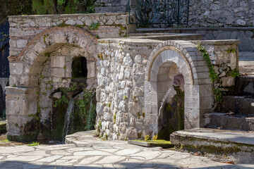 Fototapeta na wymiar Stone springs in the village Parorio (Laconia , Peloponnese, Greece)
