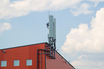 Mobile communication tower installed on the roof of the building.