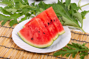 夏の代表的な食材のスイカを花からつぼみやカットした写真を撮影、素材背景にどうぞ
