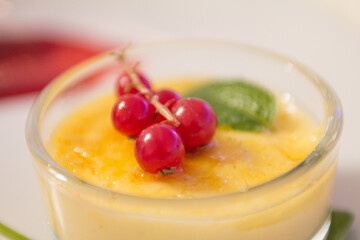 Cream brulee in a raspberries and mint dressed, Catalan Cream, starred restaurant.