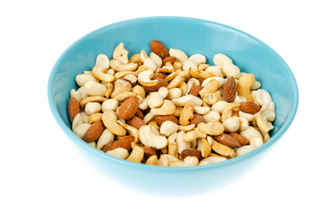 Mix of different nuts in blue bowl.
