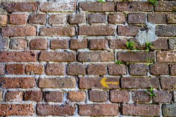 Old brick colored brick masonry whith natural hydraulic cement background textures from Fort Zachary Taylor Fortress