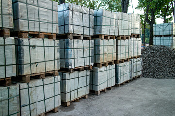 Pallets with tiles. Repair of the sidewalk, replacement of tiles in the city street. High quality photo