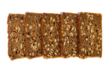 Slices of brown rye bread with sunflower seeds isolated on white background.