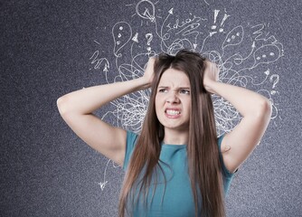 Young woman with worried stressed face.