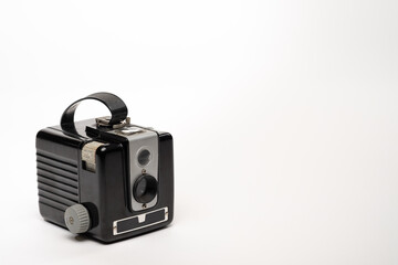 Vintage classice camera isolated on a white background with room for copy to the right