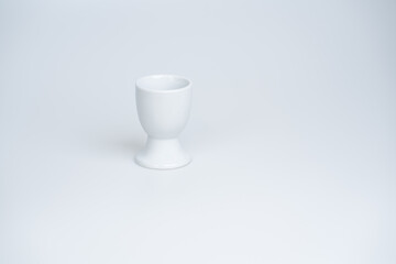 White egg cup on a white background