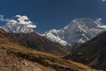 Syancha glacier and a deep valley leading south towards Manaslu summit, as seen   from Samdo village to Larkya Phedi camp on Manaslu Circuit trek, Manaslu Himal range, Gorkha district, Nepal Himalaya.