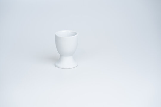 White egg cup on a white background