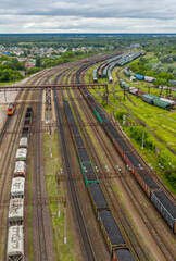 Fototapeta na wymiar aerial photo of railway tracks where trains loaded with coal stand