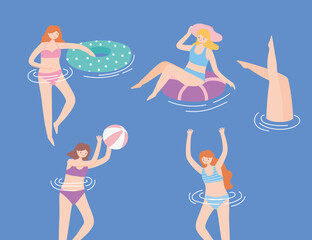 women swimming in swimwear, lying on floating inflatable, playing ball