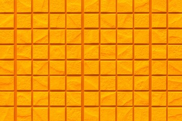 Patterned yellow cement fence wall texture and background seamless