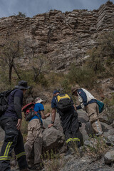 Group of Mountaineers and rescuers preparing a route
