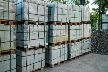 Pallets with tiles. Repair of the sidewalk, replacement of tiles in the city street. High quality photo