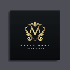Luxury Logo Design with monogram letter M ,golden color, luxury flourish decorative style, vector illustration.