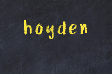 Black chalkboard with inscription hoyden on in