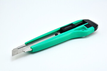 Green handy cutter with sharp metal blade