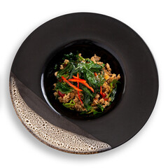 Stir fried minced pork and chili basil on white background.