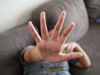 Obraz premium girl showing her denial NO with her hand.