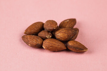 almonds On pink Background