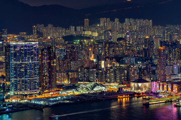 Fototapeta premium Illumination of Light of Skyscraper Buildings at Christmas Night, Kowloon Island, Hong Kong