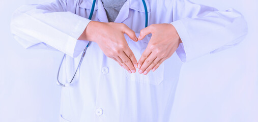 Doctor's heart shaped hand symbol On the backdrop is white.