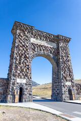Fototapeta na wymiar Roosevelt Arch at the North Entrance of Yellowstone National Park