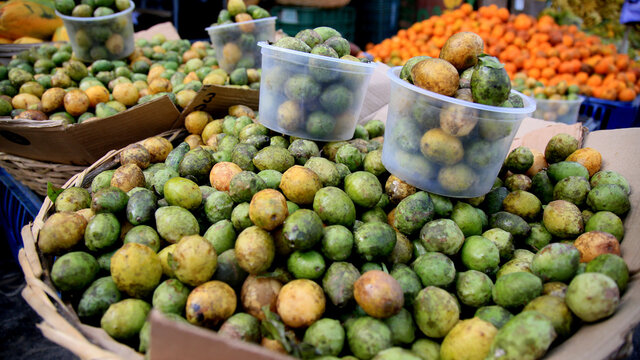 salvador, bahia / brazil - july 10, 2020: umbu fruit are seen for sale in the city of Salvador.
