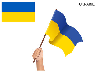 Ukrainian state flag hoisted with a stick held by hand to inflame the spirit of statehood - obrazy, fototapety, plakaty