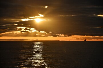 The coast of Japan is far above the horizon. Islands in the sea. Fall.