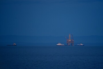 Sakhalin island. Drilling platform at sea. Fall. Around the icy water of the Sea of Okhotsk.