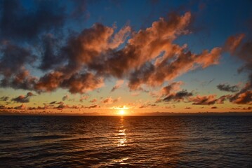 Epic cloud cover over the Pacific Ocean. Photo from the side of the ship. Autumn windy evening.