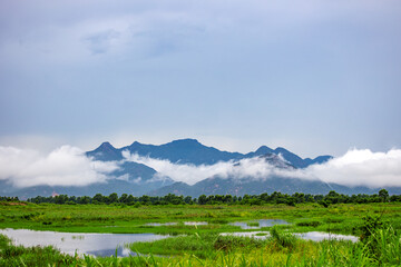 Fototapeta premium Overlooking the mountains in the mist after the rain