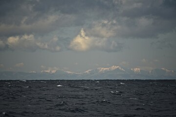 Sakhalin island. Drilling platform at sea. Fall. Around the icy water of the Sea of Okhotsk.