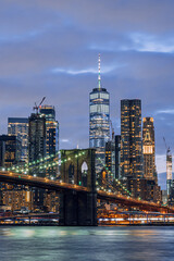 new york city skyline at brooklyn bridge