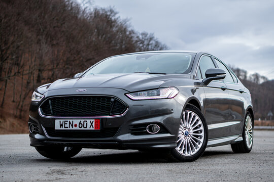 Cluj-Napoca,Cluj/Romania-01.31.2020-Ford Mondeo MK5 Sport edition with dynamic led headlights, sport front bumper, 18 inch alloy wheels, Aston Martin look a like