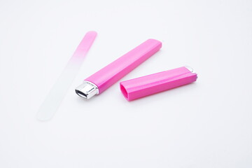 Pink pregnancy test kit on white background