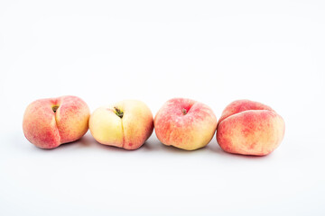 Fresh fruit flat peach on white background