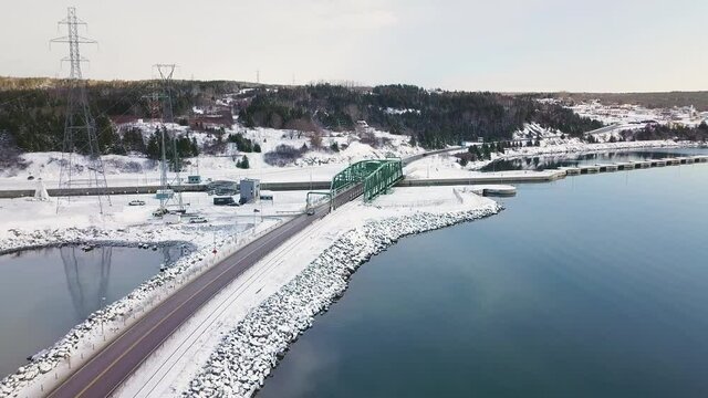 Aerial Shot of road with snow and water  Nova Scotia  Canada
