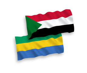 Flags of Sudan and Gabon on a white background