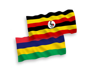 Flags of Mauritius and Uganda on a white background