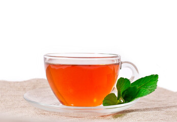 Herbal tea with mint leaves isolated on a white background. 